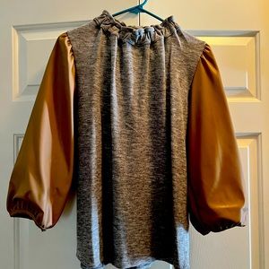 THML sweater with camel leather sleeves.